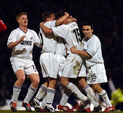 040203 - Swansea City v Darlington - Third Division - Swansea players smother Kevin Nugent after he opens the scoring