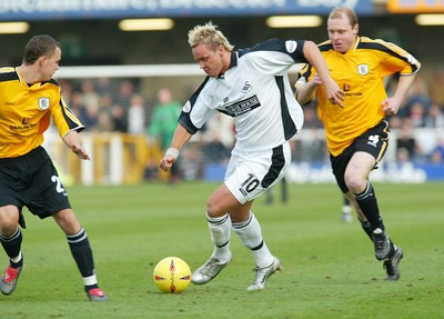 221103 - Swansea City v Darlington - Swansea's Lee Trundle tests the Darlington defence