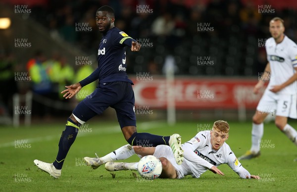 010519 - Swansea City v Derby County - SkyBet Championship - Fikayo Tomori of Derby is tackled by Jay Fulton of Swansea City