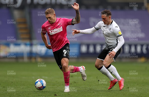 010521 - Swansea City v Derby County - SkyBet Championship - Martyn Waghorn of Derby is tackled by Connor Roberts of Swansea City