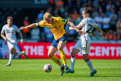 050425 - Swansea City v Derby County - Sky Bet Championship - Liam Cullen of Swansea City tackles Sondre Langas of Derby County
