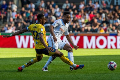 050425 - Swansea City v Derby County - Sky Bet Championship - Cyrus Christie of Swansea City takes on Ebou Adams of Derby County