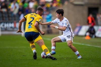 050425 - Swansea City v Derby County - Sky Bet Championship - Eom Ji-Sung of Swansea City takes on Kane Wilson of Derby County