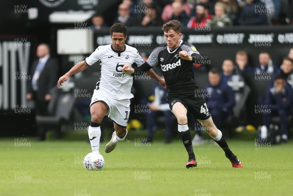 080220 - Swansea City v Derby County, Sky Bet Championship - Wayne Routledge of Swansea City and Max Bird of Derby County compete for the ball