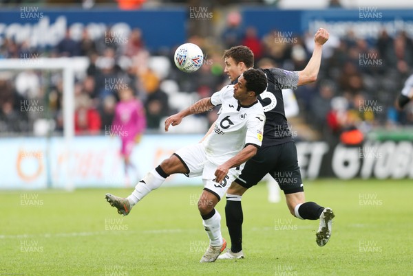 080220 - Swansea City v Derby County, Sky Bet Championship - Wayne Routledge of Swansea City wins the ball from Craig Forsyth of Derby County