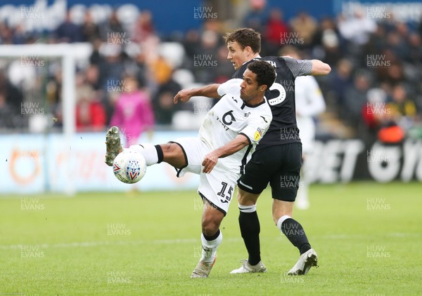 080220 - Swansea City v Derby County, Sky Bet Championship - Wayne Routledge of Swansea City wins the ball from Craig Forsyth of Derby County