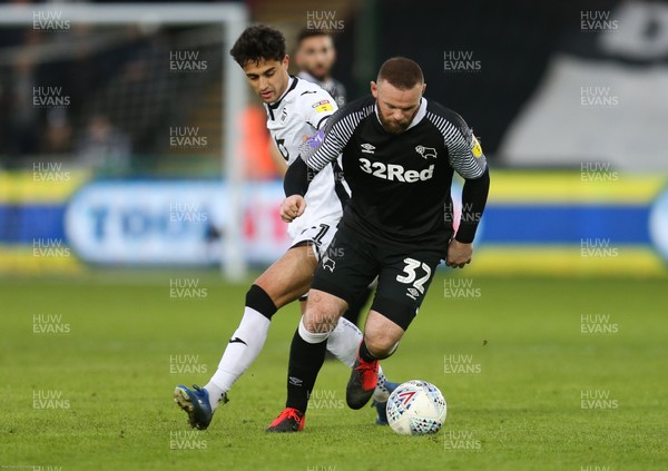 080220 - Swansea City v Derby County, Sky Bet Championship - Wayne Rooney of Derby County takes on Yan Dhanda of Swansea City