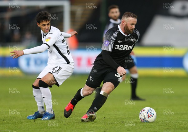 080220 - Swansea City v Derby County, Sky Bet Championship - Wayne Rooney of Derby County takes on Yan Dhanda of Swansea City