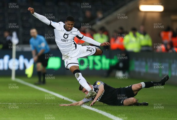 080220 - Swansea City v Derby County, Sky Bet Championship - Rhian Brewster of Swansea City is challenged by Graeme Shinnie of Derby County