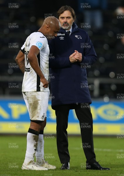 080220 - Swansea City v Derby County, Sky Bet Championship - Derby County manager Phillip Cocu talks with Andre Ayew of Swansea City at the end of the match