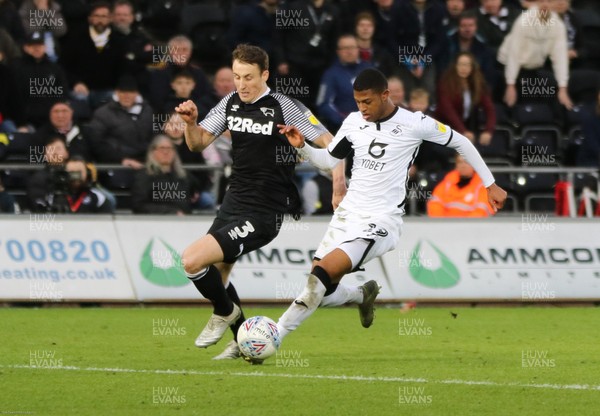 080220 - Swansea City v Derby County, Sky Bet Championship - Rhian Brewster of Swansea City takes on Craig Forsyth of Derby County