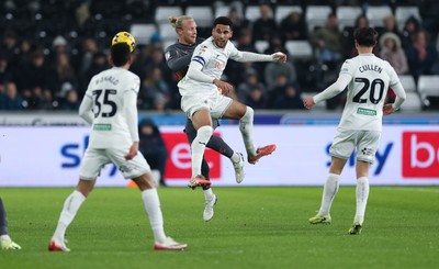 251125 - Swansea City v Derby County, EFL Sky Bet Championship - Ben Cabango of Swansea City wins the ball