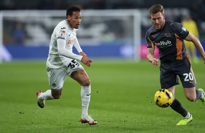 251125 - Swansea City v Derby County, EFL Sky Bet Championship - Ronald of Swansea City takes on Callum Elder of Derby County
