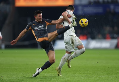 251125 - Swansea City v Derby County, EFL Sky Bet Championship - Danny Batth of Derby County and Zan Vipotnik of Swansea City compete for the ball