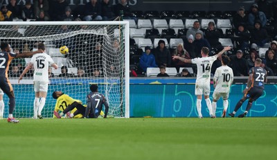 251125 - Swansea City v Derby County, EFL Sky Bet Championship - Joe Ward of Derby County, right, scores the opening goal