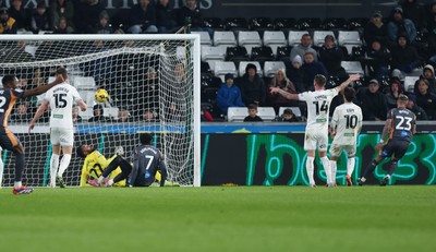 251125 - Swansea City v Derby County, EFL Sky Bet Championship - Joe Ward of Derby County, right, scores the opening goal
