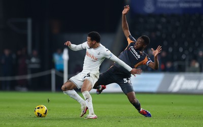 251125 - Swansea City v Derby County, EFL Sky Bet Championship - Ronald of Swansea City is challenged by Ebou Adams of Derby County
