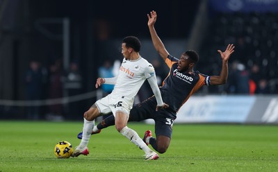 251125 - Swansea City v Derby County, EFL Sky Bet Championship - Ronald of Swansea City is challenged by Ebou Adams of Derby County