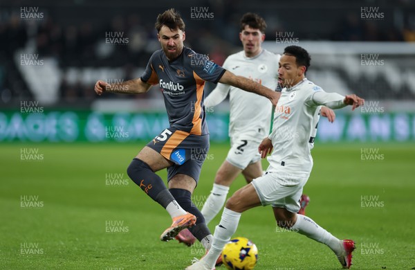 251125 - Swansea City v Derby County, EFL Sky Bet Championship - Ben Brereton Diaz of Derby County is challenged by Ronald of Swansea City