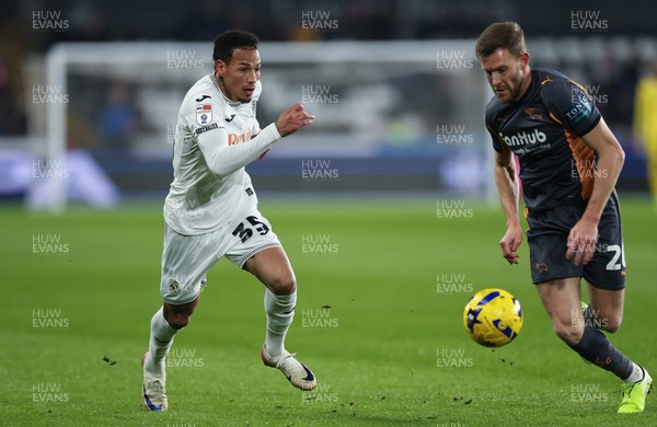 251125 - Swansea City v Derby County, EFL Sky Bet Championship - Ronald of Swansea City takes on Callum Elder of Derby County