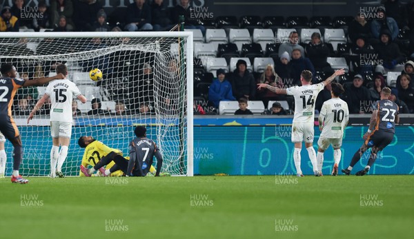 251125 - Swansea City v Derby County, EFL Sky Bet Championship - Joe Ward of Derby County, right, scores the opening goal