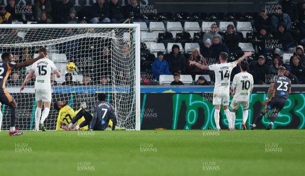 251125 - Swansea City v Derby County, EFL Sky Bet Championship - Joe Ward of Derby County, right, scores the opening goal