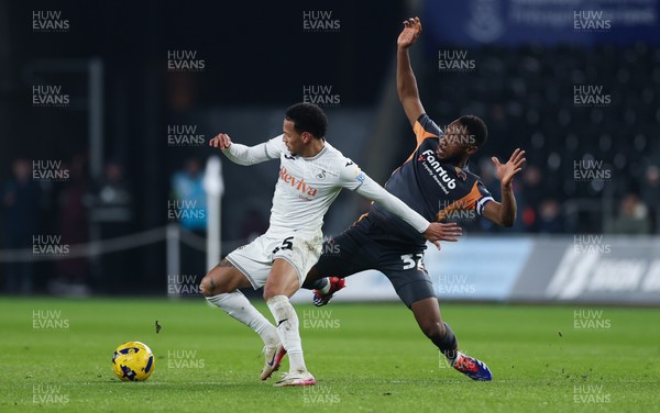 251125 - Swansea City v Derby County, EFL Sky Bet Championship - Ronald of Swansea City is challenged by Ebou Adams of Derby County