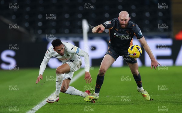 251125 - Swansea City v Derby County, EFL Sky Bet Championship - Ronald of Swansea City and Matt Clarke of Derby County compete for the ball
