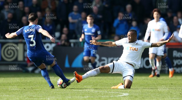 140418 - Swansea City v Everton - Premier League - Leighton Baines of Everton is tackled by Jordan Ayew of Swansea who is given a yellow card