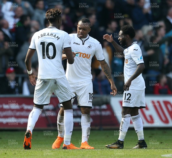 140418 - Swansea City v Everton - Premier League - Jordan Ayew of Swansea celebrates scoring a goal with Tammy Abraham and Nathan Dyer of Swansea