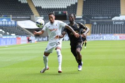 020825 - Swansea City v FC Lorient - Preseason Friendly - Ronald of Swansea City takes on Darlin Yogwa of FC Lorient