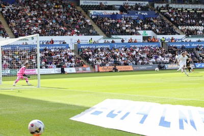 020825 - Swansea City v FC Lorient - Preseason Friendly - Liam Cullen of Swansea City scores a goal from the penalty spot
