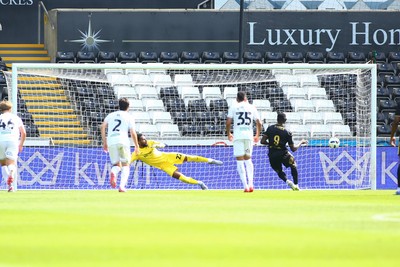 020825 - Swansea City v FC Lorient - Preseason Friendly - Mohamad Bamba of FC Lorient sends Lawrence Vigouroux of Swansea City the wrong way to score a goal from the penalty spot 