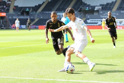 020825 - Swansea City v FC Lorient - Preseason Friendly - Jisung Eom of Swansea City whips in a cross