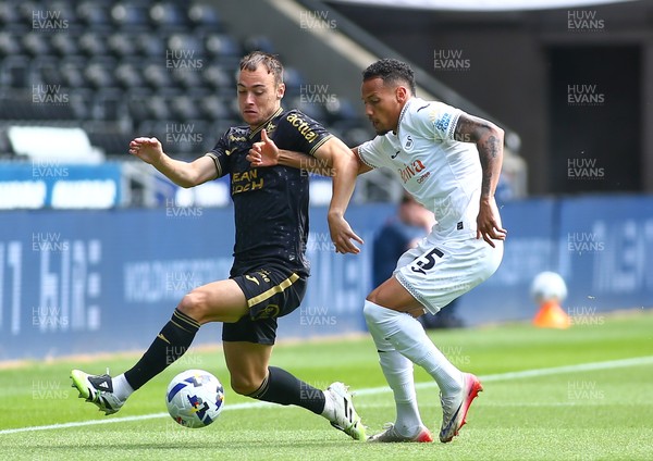 020825 - Swansea City v FC Lorient - Preseason Friendly - Ronald of Swansea City challenges Pablo Pagis of FC Lorient for the ball