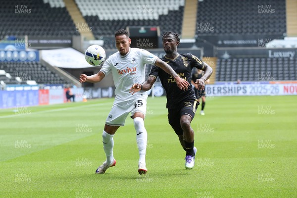 020825 - Swansea City v FC Lorient - Preseason Friendly - Ronald of Swansea City takes on Darlin Yogwa of FC Lorient