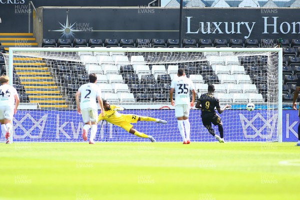 020825 - Swansea City v FC Lorient - Preseason Friendly - Mohamad Bamba of FC Lorient sends Lawrence Vigouroux of Swansea City the wrong way to score a goal from the penalty spot 