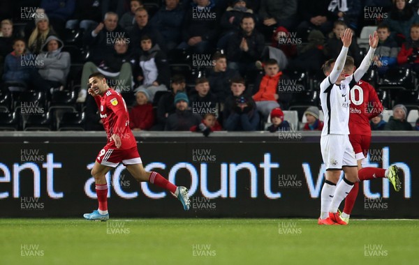 291119 - Swansea City v Fulham - SkyBet Championship - Aleksandar Mitrovic of Fulham celebrates scoring a goal alongside a frustrated Connor Roberts of Swansea City
