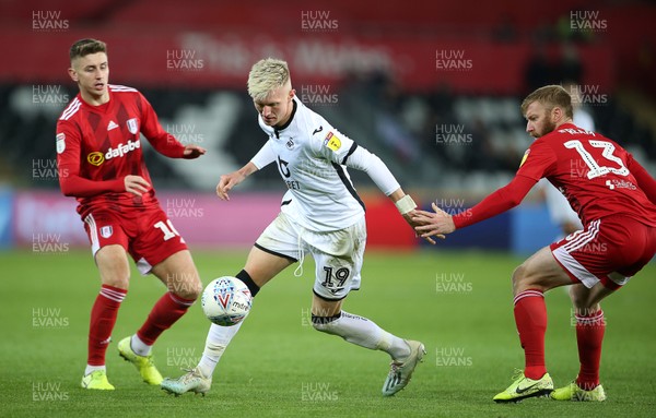 291119 - Swansea City v Fulham - SkyBet Championship - Sam Surridge of Swansea City is challenged by Tim Ream of Fulham