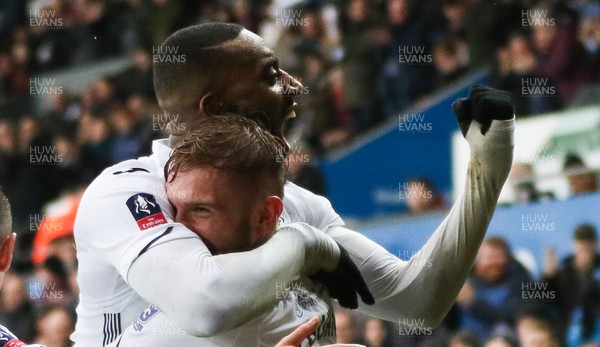 260119 -  Swansea City v Gillingham, FA Cup Fourth Round - Oli McBurnie of Swansea City celebrates with Leroy Fer of Swansea City after scoring the first goal