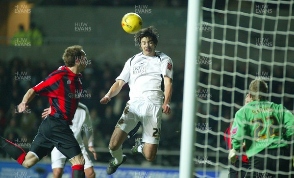 240206Swansea City v Huddersfield Swansea's Rory Fallon heads at goal 