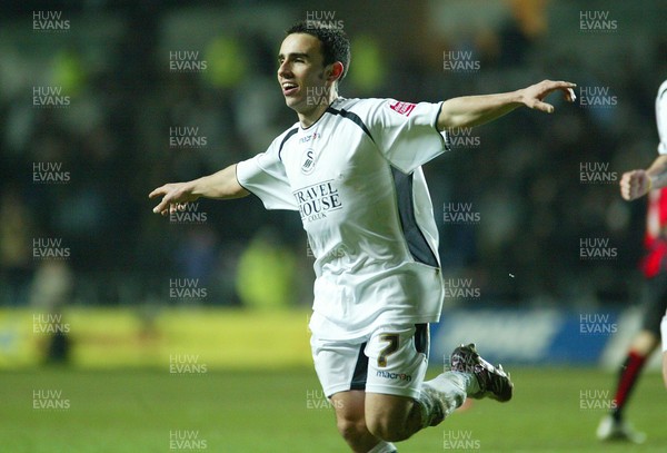 240206Swansea City v Huddersfield Swansea's Leon Britton celebrates scoring his goal (Swansea's 2nd)  