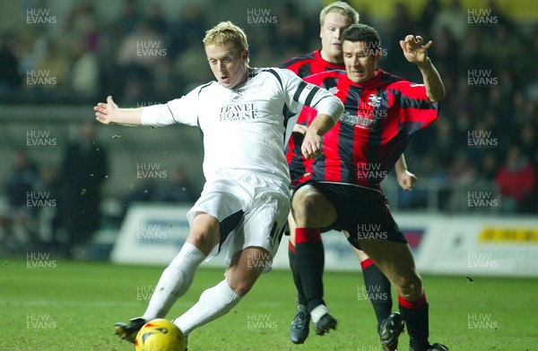 240206Swansea City v Huddersfield Swansea's Garry Monk fires shot at goal 