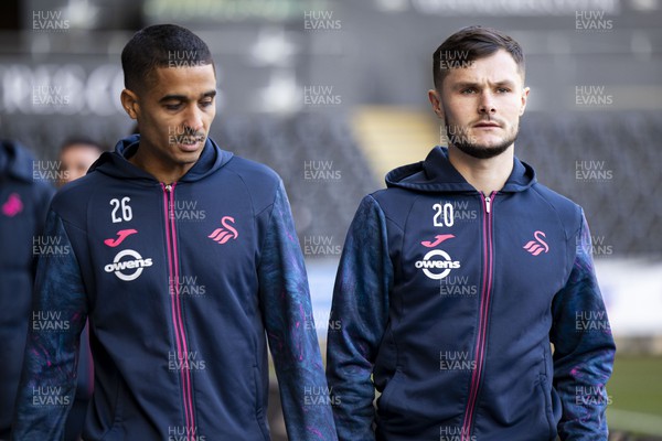 021223 - Swansea City v Huddersfield Town - Sky Bet Championship - Kyle Naughton & Liam Cullen of Swansea City arrives ahead of the match