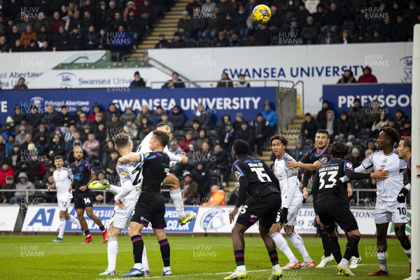 021223 - Swansea City v Huddersfield Town - Sky Bet Championship - Ben Cabango of Swansea City watches his header over the bar