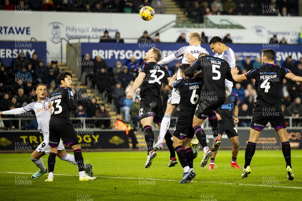 021223 - Swansea City v Huddersfield Town - Sky Bet Championship - Ben Cabango of Swansea City with a header on goal 