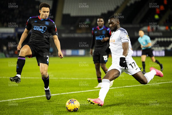 021223 - Swansea City v Huddersfield Town - Sky Bet Championship - Yannick Bolasie of Swansea City in action against Rarmani Edmonds-Green of Huddersfield Town