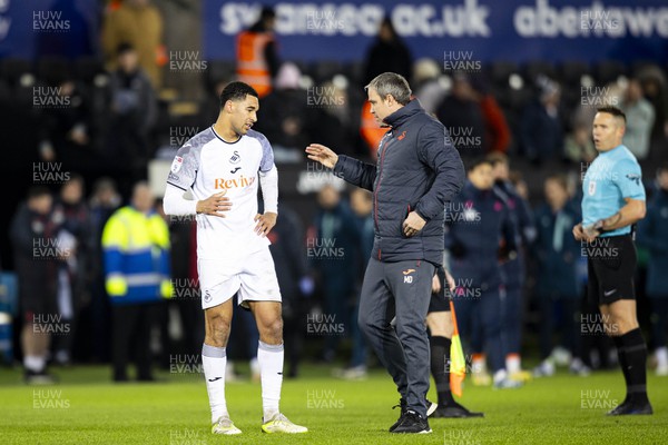 021223 - Swansea City v Huddersfield Town - Sky Bet Championship - Swansea City manager Michael Duff with Ben Cabango of Swansea City at full time