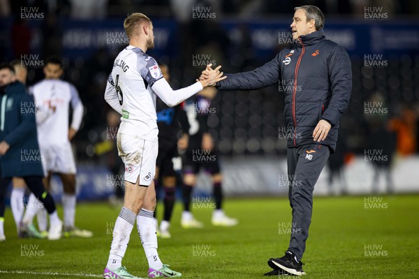 021223 - Swansea City v Huddersfield Town - Sky Bet Championship - Swansea City manager Michael Duff with Harry Darling of Swansea City at full time