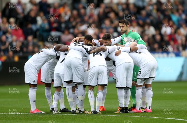141017 - Swansea City v Huddersfield Town - Premier League - Swansea team huddle